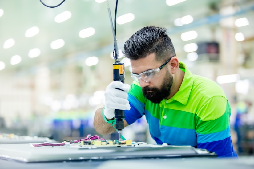Production employee checking documents
