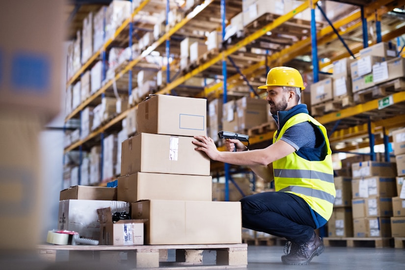 Warehouse racks and an employee in the warehouse